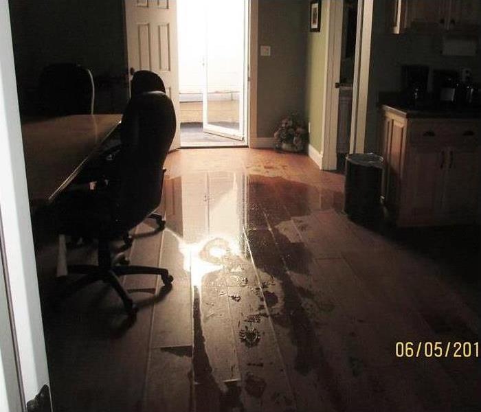 water soaked office due to a pipe burst